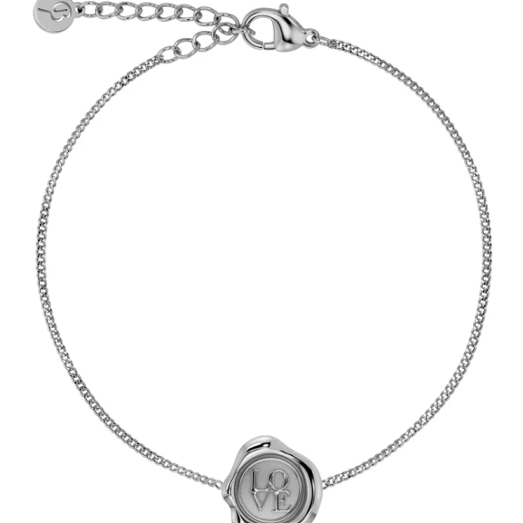 Armband i polerat rostfritt stål med sigillformad dekoration