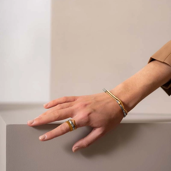 Omega Bangle - Steel & Gold - Skultuna - Snabb frakt & paketinslagning - Nordicspectra.se