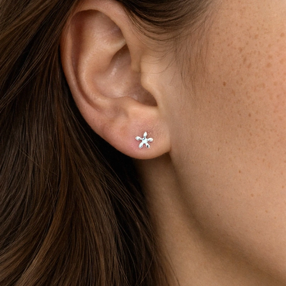 små stjärnformade smycken med tidlös design.