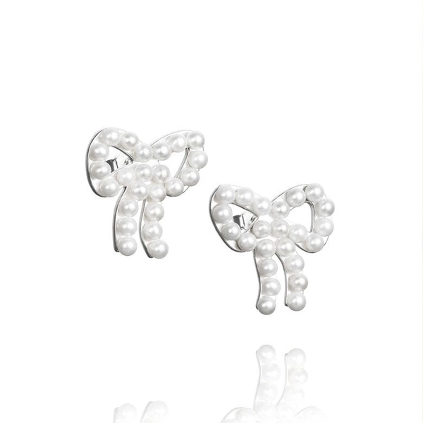 Mini Pearls Bow Ear - Efva Attling örhängen - Snabb frakt & paketinslagning - Nordicspectra.se