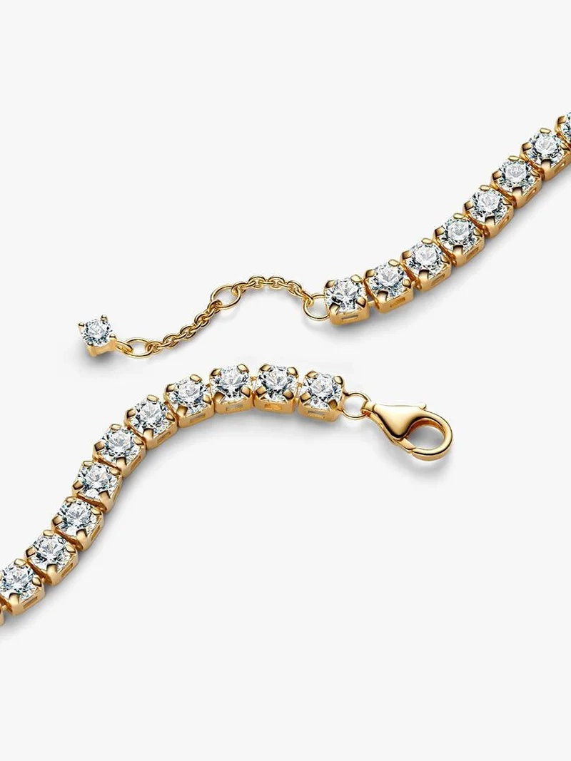 Glittrande tennisarmband Bold Guld från Pandora Timeless kollektionen med cubic zirconia stenar och 14 karat guldplätering.