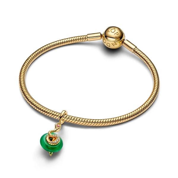 Ormönstrat hängberlock i ormgrönt Muranoglas med 14K guld och stenar. Symboliserar visdom och förändring