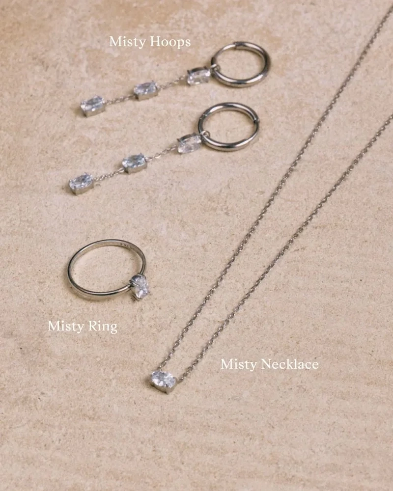 pdp_misty_ring_necklace_hoops_steel_clear_flatlay_1