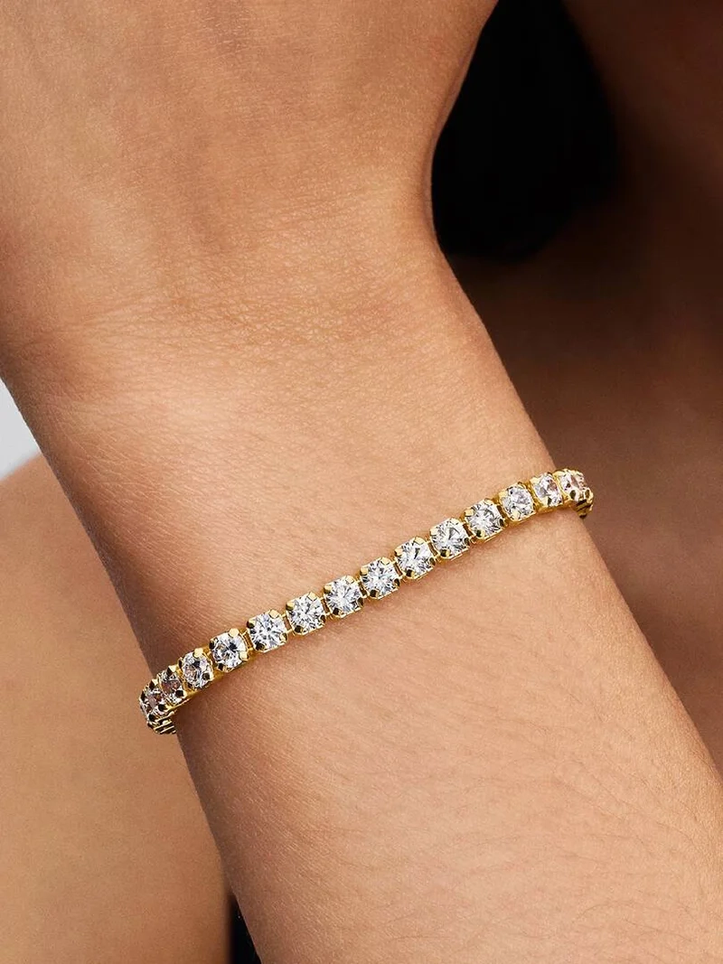 Glittrande tennisarmband Bold Guld från Pandora Timeless kollektionen med cubic zirconia stenar och 14 karat guldplätering.
