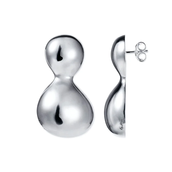 organiska former som hyllar moderskapets kraft och kärlek.