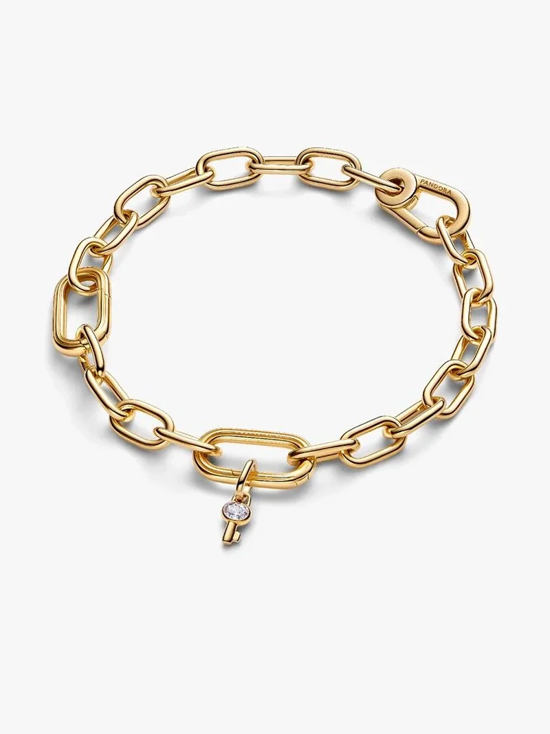 Nyckel Minihängberlock Guld med glittrande zirkonia och stjärna. Skapar en fräsch och unik förändring i din dagliga stil med glamour och elegans.