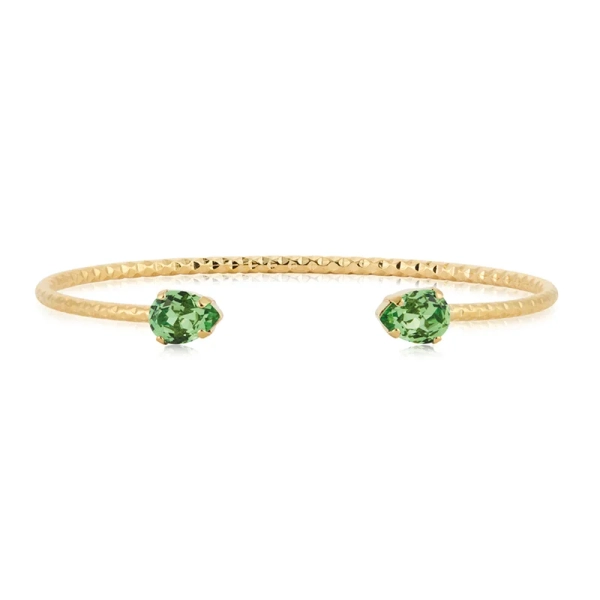 Guldpläterat Amelia-armband med två gröna Swarovski Recreated Peridot-kristaller från Caroline Svedbom.