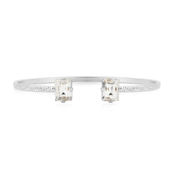 Diora Stud Bracelet i rhodiumpläterad mässing med skimrande Swarovski-kristaller