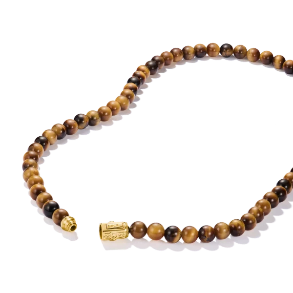 Elyndra tigeraögonkedja från Thomas Sabo med rundpolerade tigeröga-pärlor och guldpläterad detalj med gravyr.