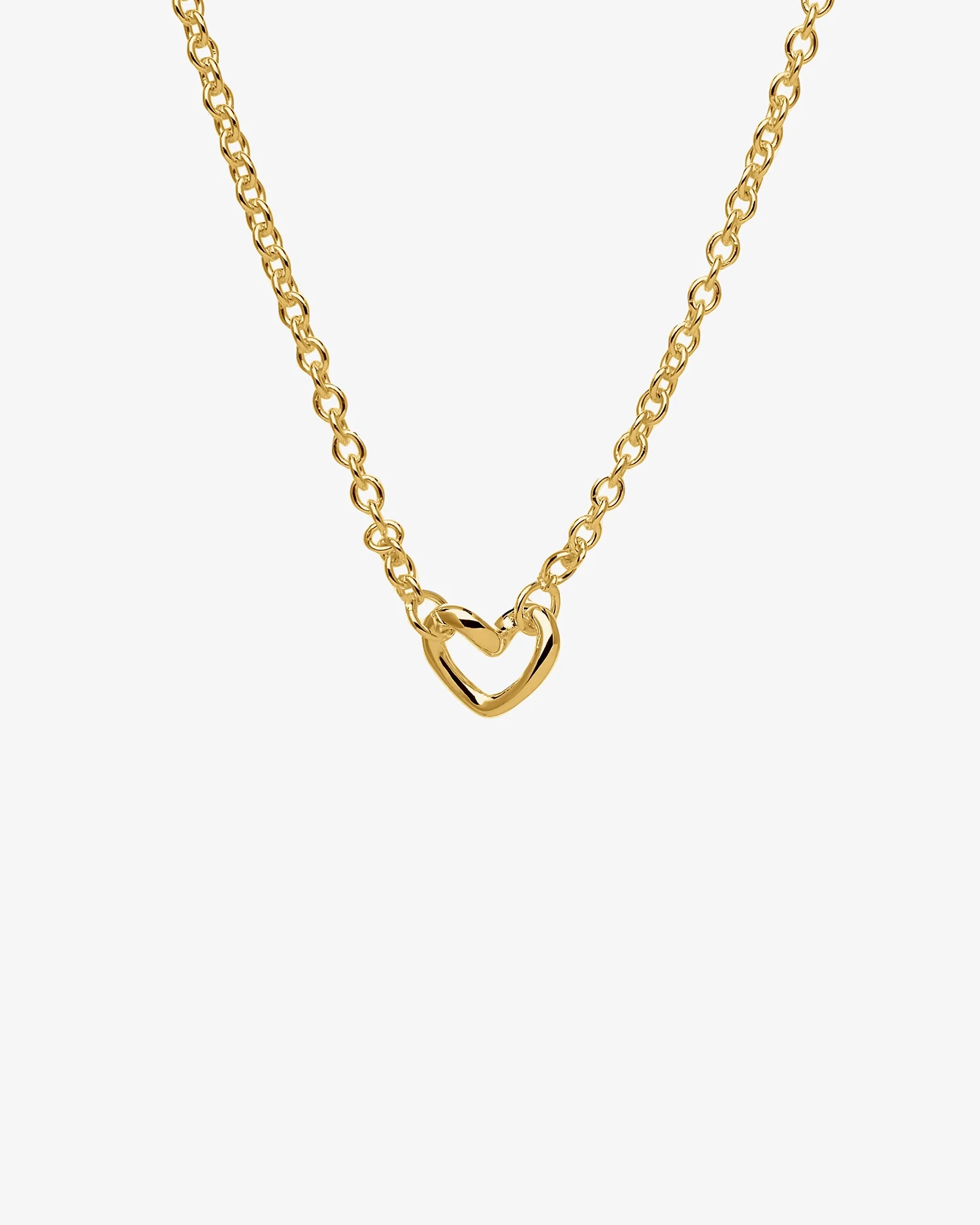 halsband och örhängen i 18K guld med små hjärtan och mjuka former