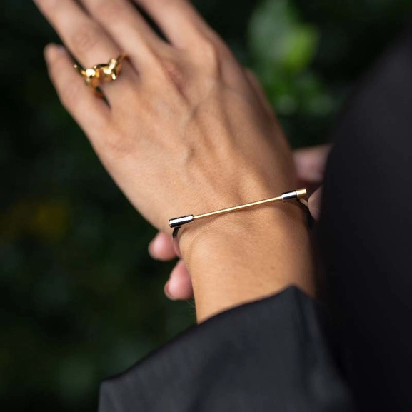 Omega Bangle - Steel & Gold - Skultuna - Snabb frakt & paketinslagning - Nordicspectra.se