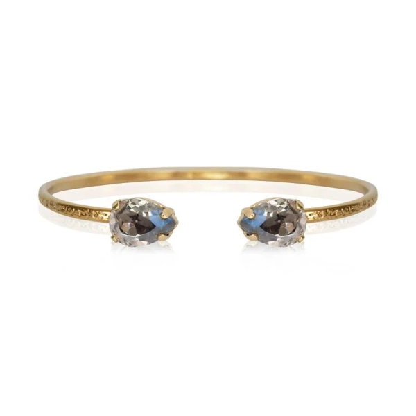 Guldfärgat armband med små svarta diamanter
