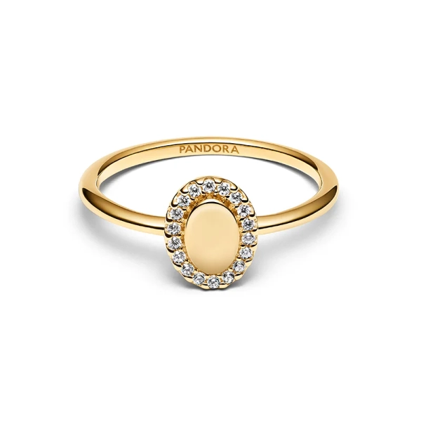 Oval Halo Ring Guld från Pandora Timeless med ädelsten i mitten och gnistrande stenar runtom. Ge din stil en personlig prägel med denna exklusiva ring.