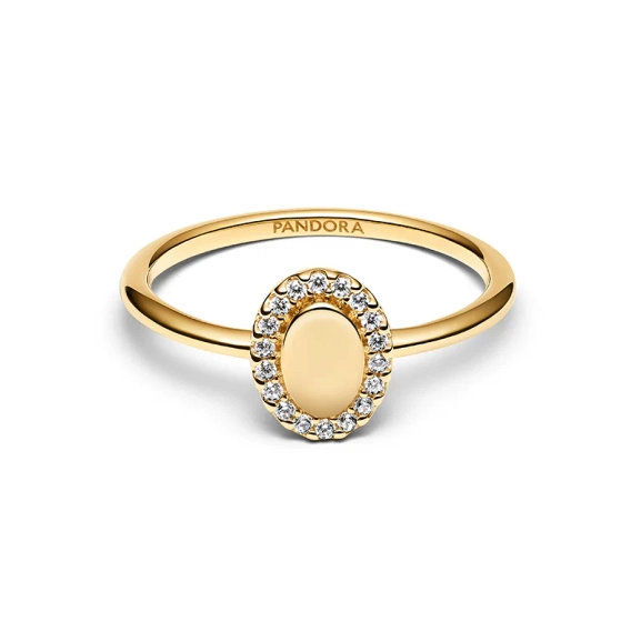 Oval Halo Ring Guld från Pandora Timeless med ädelsten i mitten och gnistrande stenar runtom. Ge din stil en personlig prägel med denna exklusiva ring.