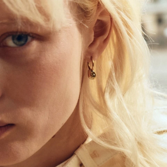 prytt med oregelbundet formad sten