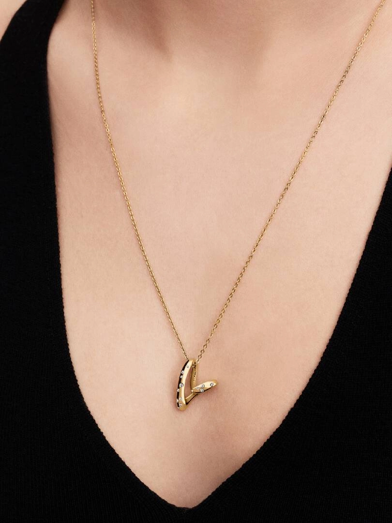 förgyllt med 14K guld och hjärthänge med gnistrande stenar.