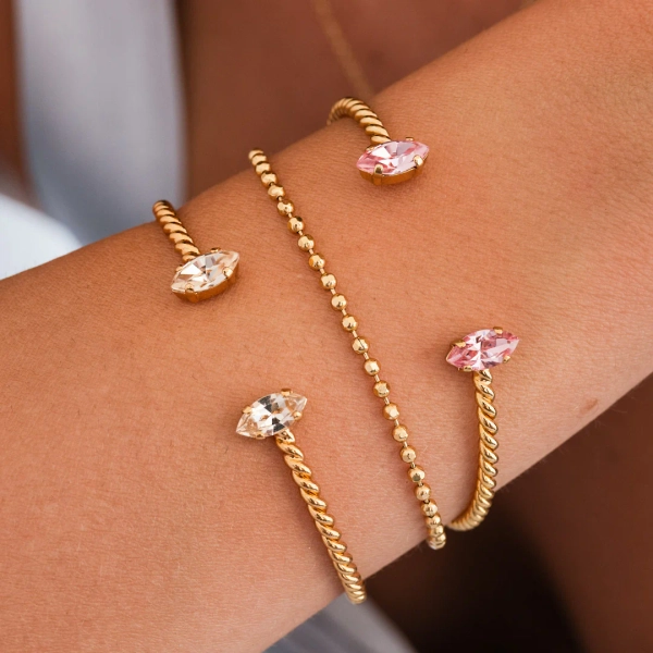 Petite Navette Bracelet i guld med ljusa silkesfärgade kristaller
