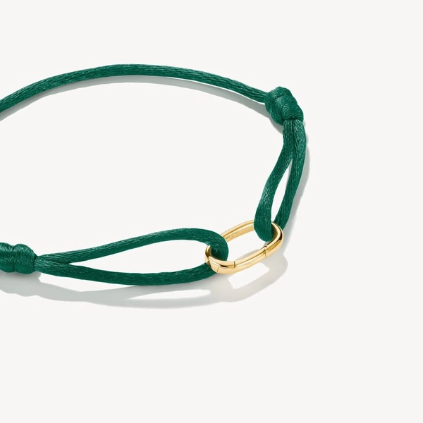 grönt textilarmband med guldpläterad silverlänk