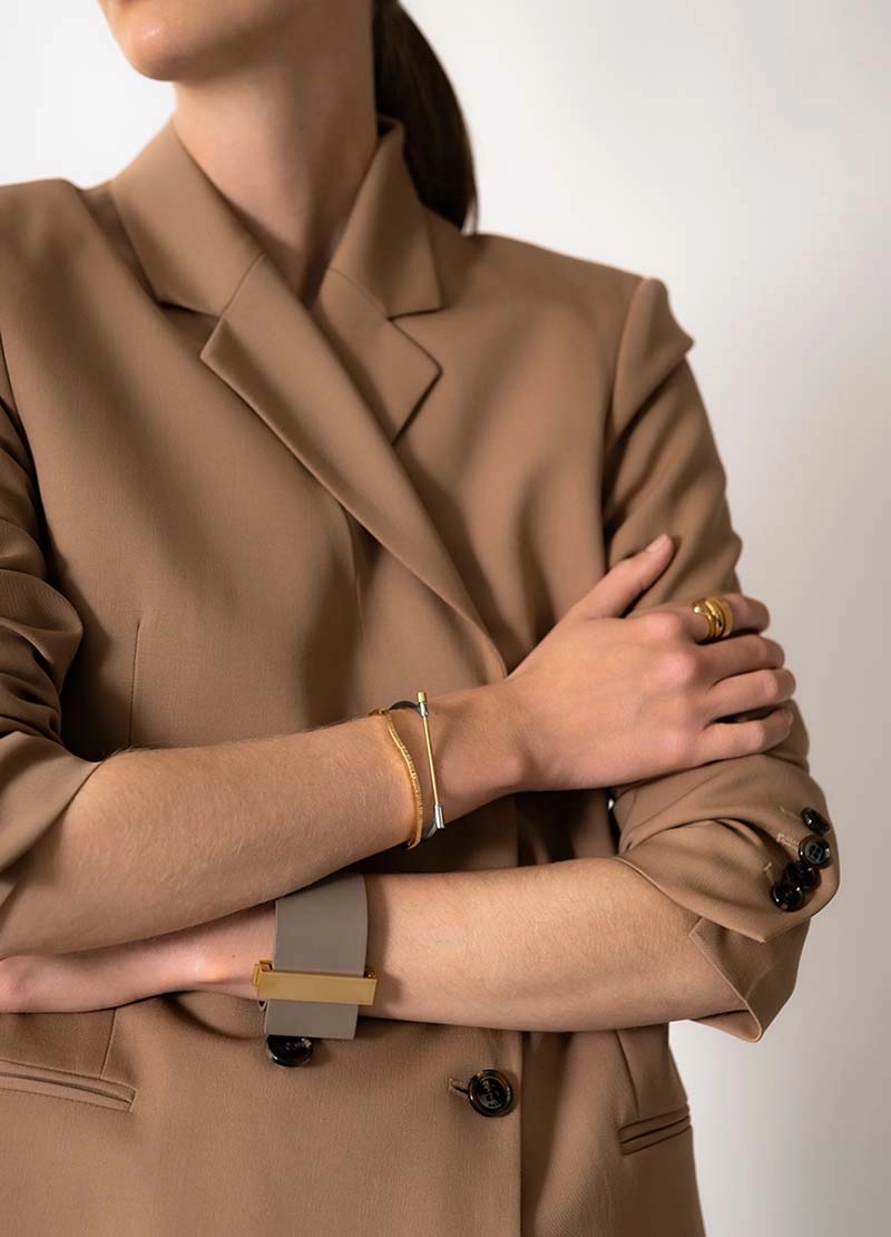 Omega Bangle - Steel & Gold - Skultuna - Snabb frakt & paketinslagning - Nordicspectra.se