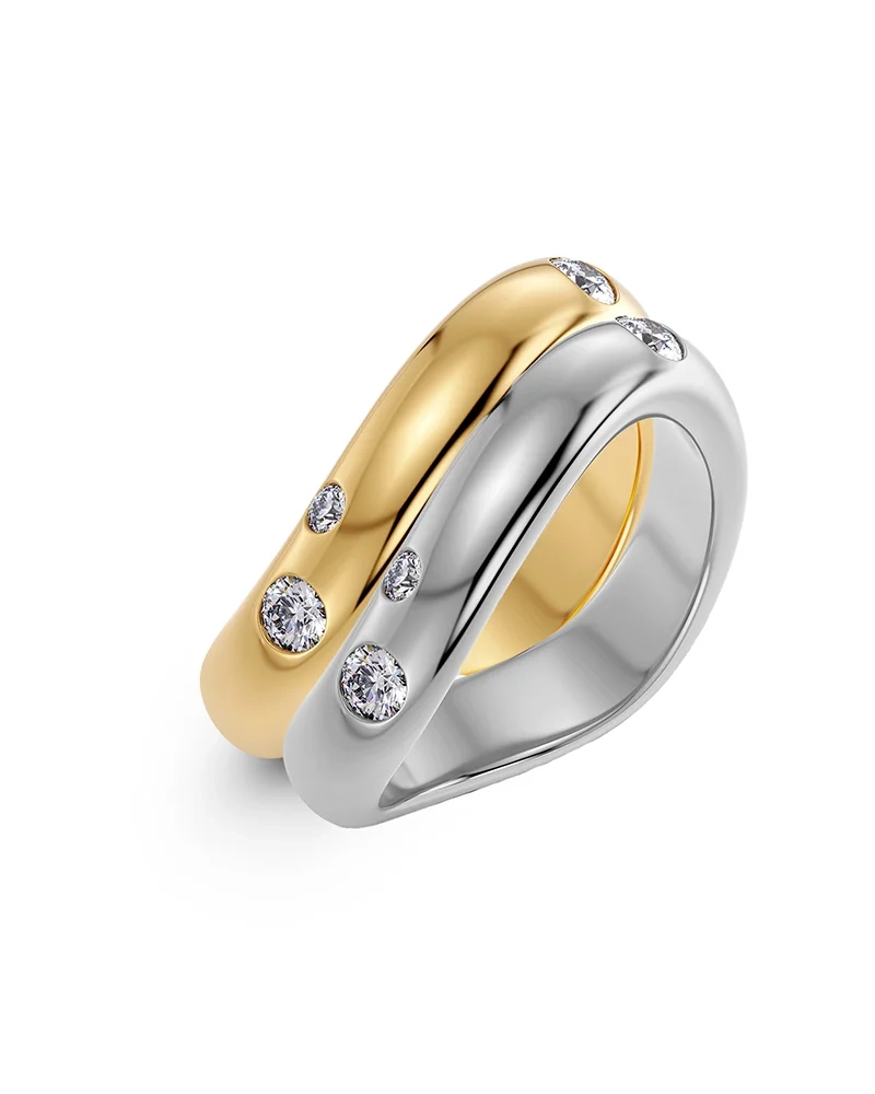 Två Selena-ringar i stål och guld med cubic zirconia