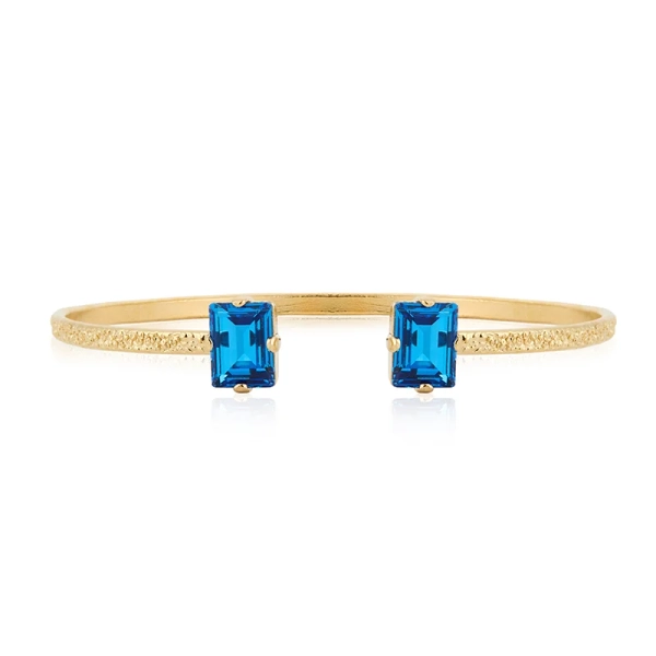 Guldpläterat armband med isblå Swarovski® kristaller från Caroline Svedbom