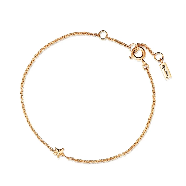 Micro Catch A Falling Star Bracelet Gold i 18K guld med en liten stjärna