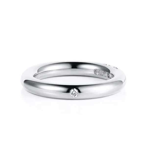tunn platina-ring med briljantslipad diamant