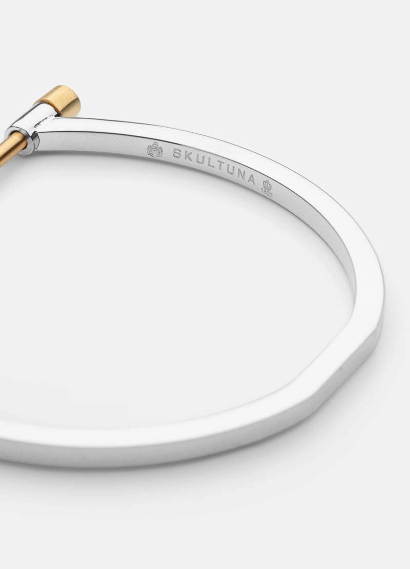 Omega Bangle - Steel & Gold - Skultuna - Snabb frakt & paketinslagning - Nordicspectra.se