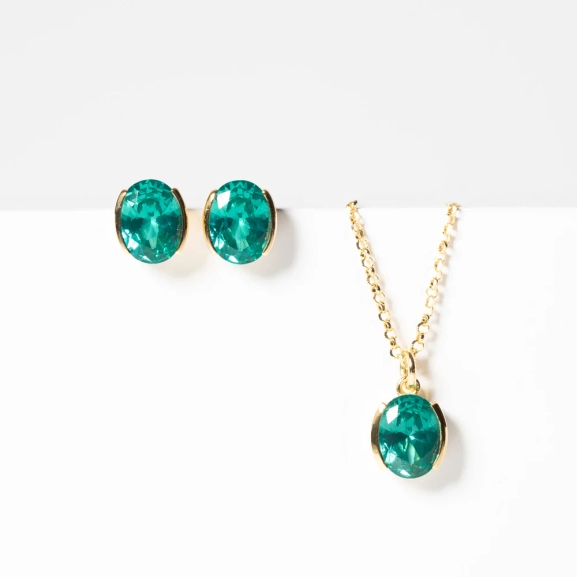 Ellisse Carezza Örhängen i turkos och guld med gnistrande cubic zirconia