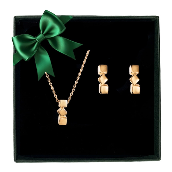Presentset med halsband och örhängen i 18K guld från Efva Attlings Dice-kollektion