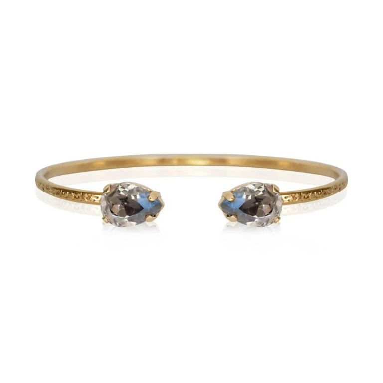 Guldfärgat armband med små svarta diamanter