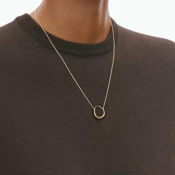 Offspring Hängsmycke Litet i 18K guld med briljantslipade diamanter från Georg Jensen