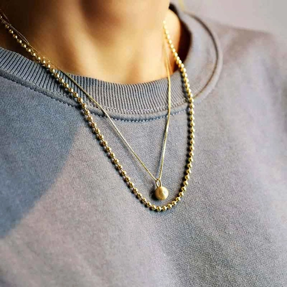 Sparkling Globe Necklace Gold - Emma Israelsson - Suuri valikoima & ilmainen lahjapaketointi - Nordicspectra.fi