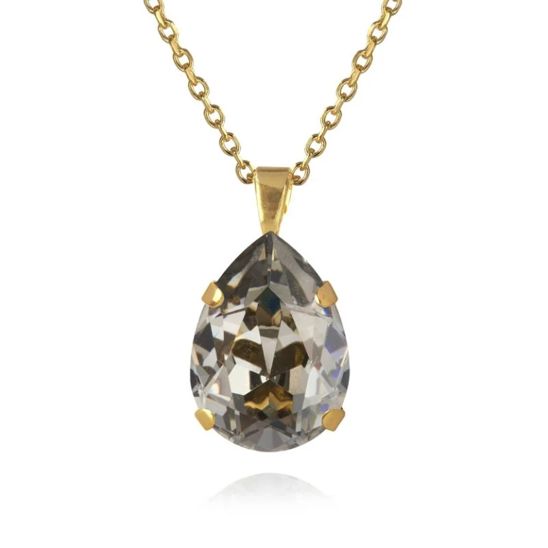 Halsband i guld med en liten svart diamant