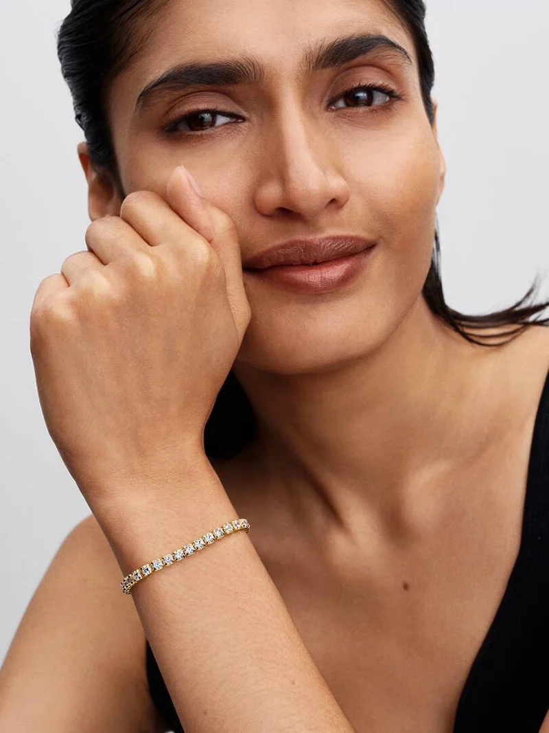 Glittrande tennisarmband Bold Guld från Pandora Timeless kollektionen med cubic zirconia stenar och 14 karat guldplätering.