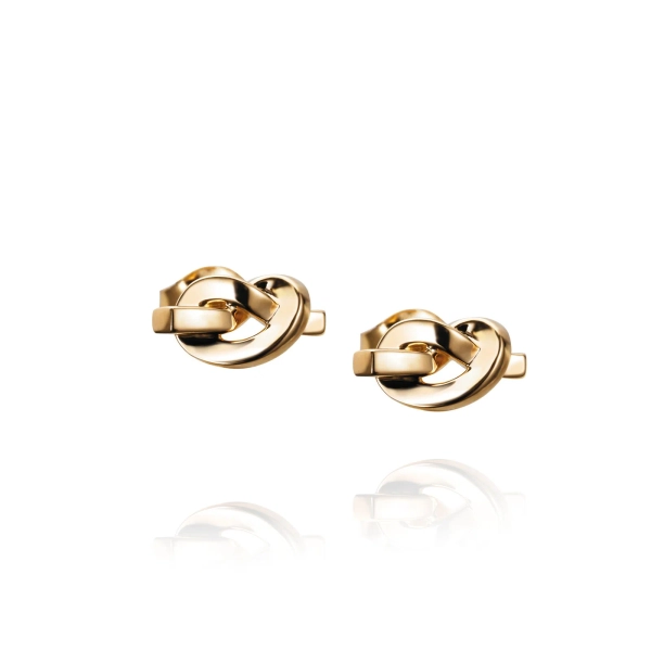 Die Ohrringe „Love Knot Ear“ von Efva Attling sind aus 18-karätig vergoldetem Silber gefertigt und elegant. Sie symbolisieren die Liebe.