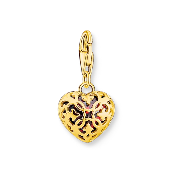 med granatröd zirkonia och intrikata arabesker