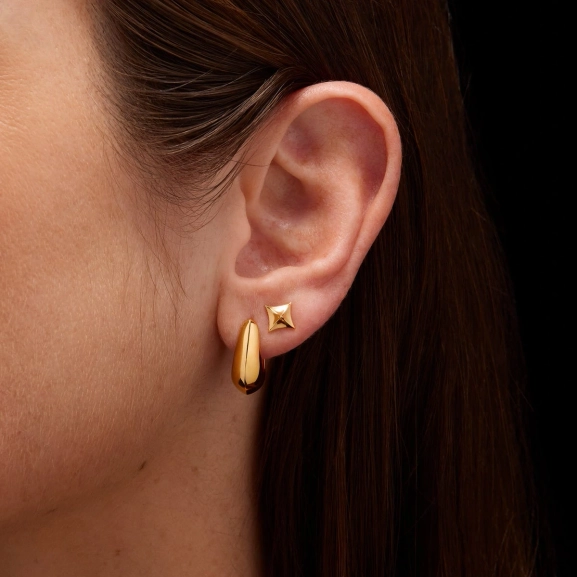 in Form einer Turmspitze