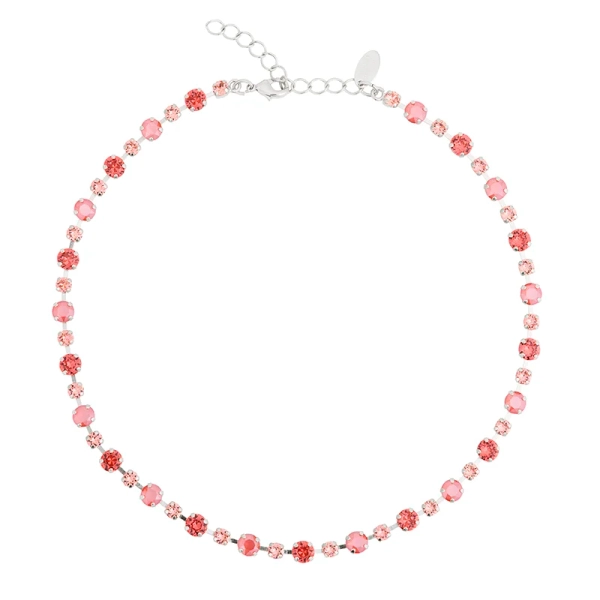Halsband i rhodiumpläterad mässing med facetterade Swarovski-kristaller i varm korallrosa ton