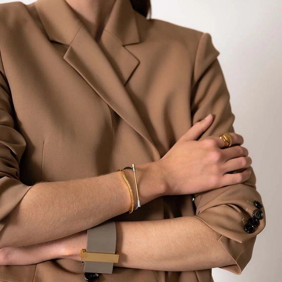 Omega Bangle - Steel & Gold - Skultuna - Snabb frakt & paketinslagning - Nordicspectra.se