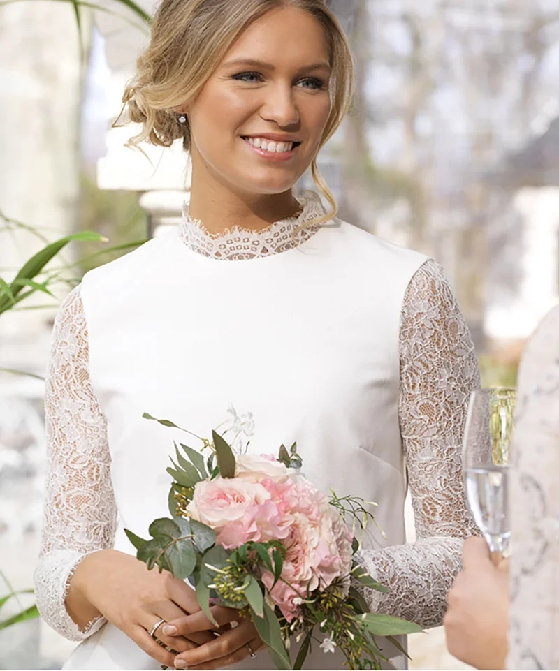 Blomdahl Tiffany örhängen i medicinsk titan med vita cubic zirconia