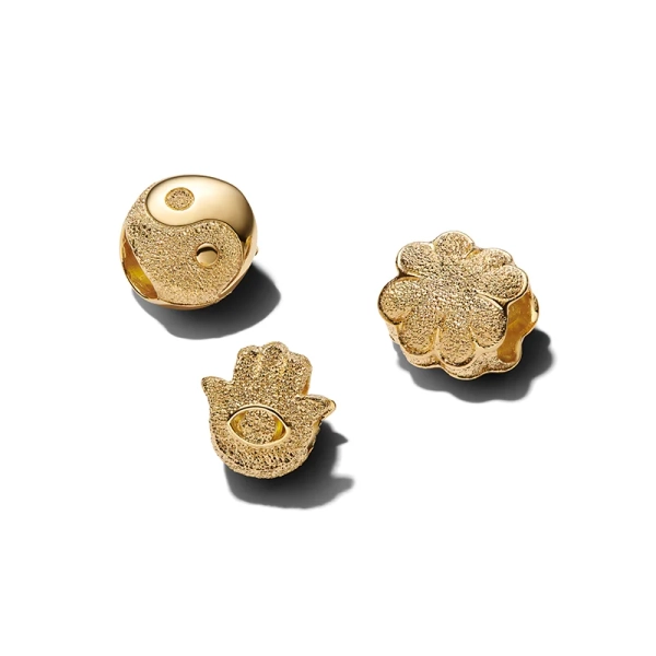 Berlockset Välmående & Lycka Guld från Pandora med tre mini berlocker: Yin & Yang