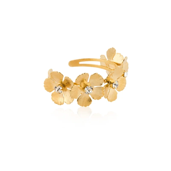 Guldpläterat armband med blomformade detaljer och gnistrande Swarovski-kristaller från Caroline Svedbom.
