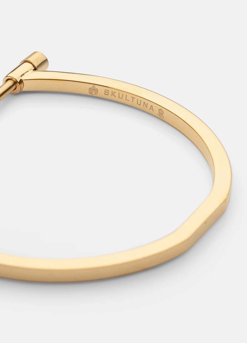 Omega Bangle - Gold - Skultuna - Snabb frakt & paketinslagning - Nordicspectra.se