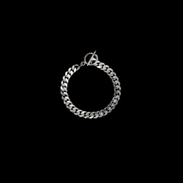 Claw Faceted Bracelet i silver med 9 mm bredd och klolåsning från Maria Nilsdotter