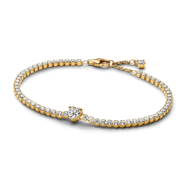 Sparkling Heart Tennis-Armband aus Gold mit einem herzförmigen Stein in der Mitte und 58 verblassten Steinen um das Handgelenk. Ein Symbol für Liebe und Schönheit