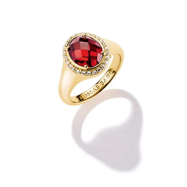 Rund Röd Ring Guld från Thomas Sabo med oval röd zirkonia och pavé-halo på 18K guldpläterat silver.