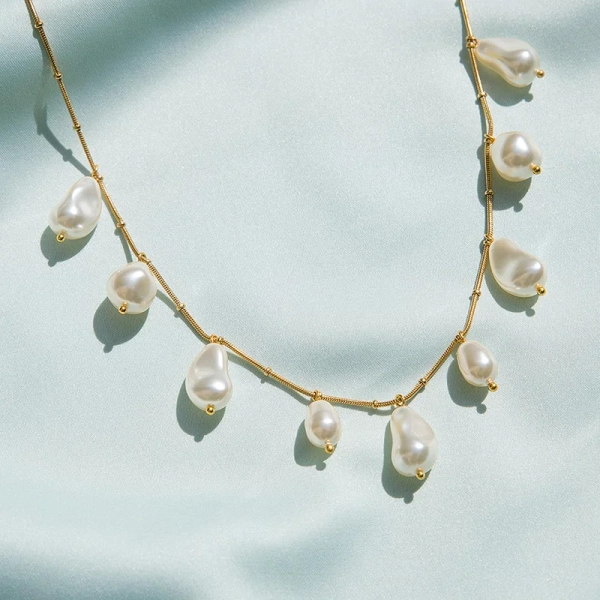 Olympia Necklace Gold Pearl - Caroline Svedbom - Snabb frakt & paketinslagning - Nordic Spectra