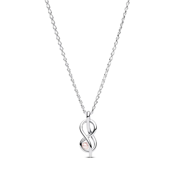 aus Sterlingsilber mit einer rosafarbenen Kunstperle und funkelnden Steinen. Einstellbare Länge. Anspruchsvolles und elegantes Design.