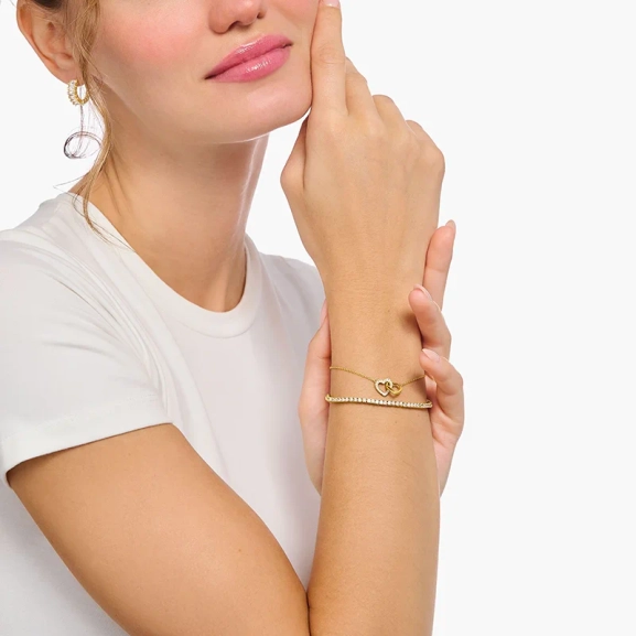 Armband med Sammanlänkade Hjärtan Guld - Thomas Sabo - Snabb leverans & paketinslagning - Nordic Spectra